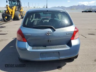 2008 Toyota Yaris with VIN JTDJT923185164654, listed as a Copart auction lot 54052575 with 242,505 mi miles and Salvage Title. Bid and sale history available at DreamBid. Image 6.