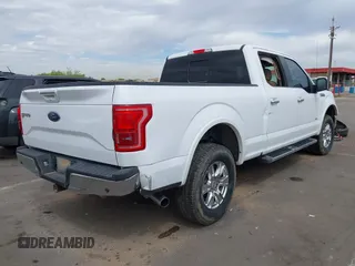 2015 Ford F-150 XLT w/HD Payload Pkg with VIN 1FTFW1EG0FKD99316, listed as a IAAI auction lot 42024645 with 275,335 mi miles. Bid and sale history available at carsss.com. Image 4.