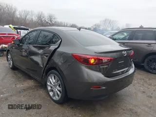 2014 Mazda 3 S Touring with VIN JM1BM1V31E1111499, listed as a IAAI auction lot 41476457 with 109,337 mi miles and . Bid and sale history available at DreamBid. Image 3.