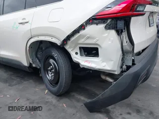 2024 Toyota Highlander XLE with VIN 5TDAAAA59RS007427, listed as a IAAI auction lot 42272224 with 14,260 mi miles and . Bid and sale history available at DreamBid. Image 6.