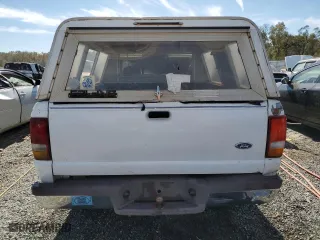 1996 Ford Ranger XLT with VIN 1FTCR14X6TPA21365, listed as a Copart auction lot 76412404 with 297,185 mi miles and Non Repairable. Bid and sale history available at carsss.com. Image 6.