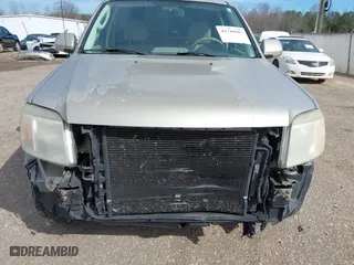 2010 Mercury Mariner Premier with VIN 4M2CN8HG4AKJ05736, listed as a IAAI auction lot 41744987 with 209,819 mi miles. Bid and sale history available at carsss.com. Image 6.