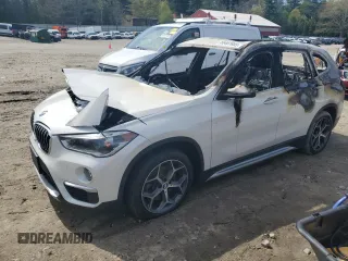 2019 BMW X1 xDrive28i with VIN WBXHT3C55K5L89892, listed as a Copart auction lot 55467665 with Not provided miles and Salvage title. Bid and sale history available at DreamBid. Image 1.