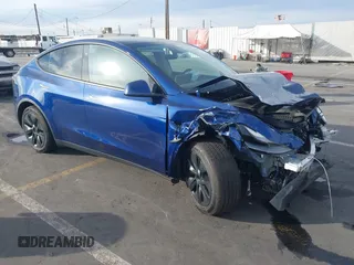 2025 Tesla Model Y Long Range with VIN 7SAYGDED2SF219423, listed as a IAAI auction lot 40984912 with 728 mi miles and . Bid and sale history available at DreamBid. Image 1.