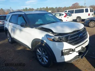2021 Ford Explorer XLT with VIN 1FMSK8DH4MGA10203, listed as a IAAI auction lot 40713164 with 48,285 mi miles. Bid and sale history available at carsss.com. Image 1.