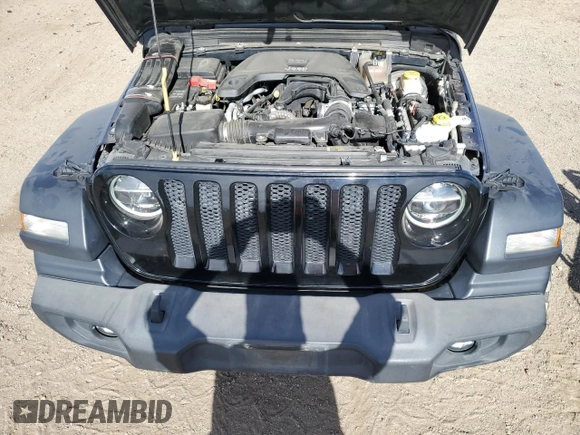 2020 Jeep Wrangler Unlimited Willys with VIN 1C4HJXDG5LW246978, listed as a Copart auction lot 52930515 with 117,020 mi miles and Salvage title. Bid and sale history available at DreamBid. Image 14.