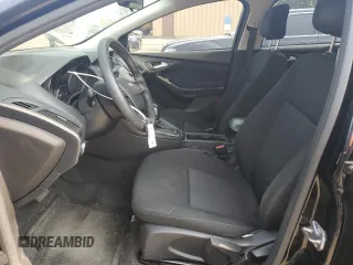 2018 Ford Focus SE z VIN 1FADP3F2XJL228407, wystawiony jako Copart lot #59254415 z przebiegiem 75 241 mil mil oraz Szkoda całkowita • Salvage title. Historia ofert i sprzedaży dostępna na DreamBid. Obrazek 7.