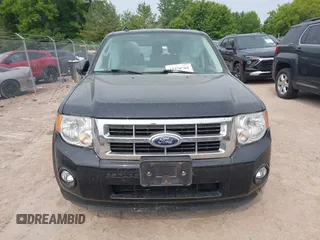 2012 Ford Escape XLT z VIN 1FMCU0DG3CKB39813, wystawiony jako IAAI lot #42378765 z przebiegiem 91 714 mil mil oraz . Historia ofert i sprzedaży dostępna na DreamBid. Obrazek 13.