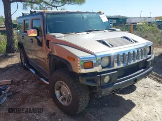 2005 Hummer H2 SUV with VIN 5GRGN23U85H129007, listed as a IAAI auction lot 41625417 with 102,389 mi miles. Bid and sale history available at carsss.com. Image 1.