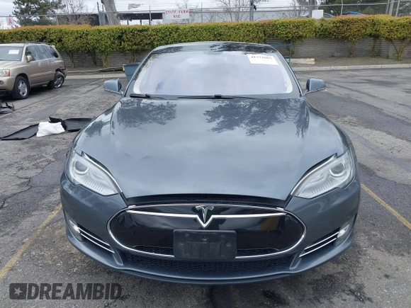2013 Tesla Model S with VIN 5YJSA1CN8DFP21869, listed as a IAAI auction lot 41772603 with Not provided miles and . Bid and sale history available at DreamBid. Image 11.