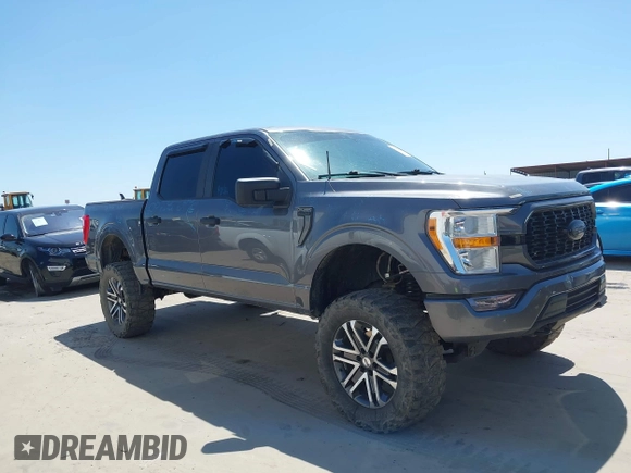 2021 Ford F-150 XL z VIN 1FTFW1E52MFB42324, wystawiony jako IAAI lot #41916379 z przebiegiem 61 369 mil mil oraz . Historia ofert i sprzedaży dostępna na DreamBid. Obrazek 13.