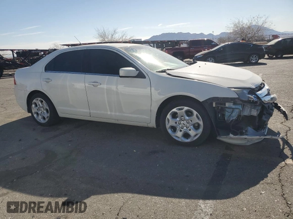 2011 Ford Fusion SE with VIN 3FAHP0HAXBR263004, listed as a Copart auction lot 42732605 with 119,286 mi miles and Salvage Title. Bid and sale history available at DreamBid. Image 4.