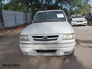 2002 Mazda B-Series 2WD Truck DS with VIN 4F4YR16V12TM23907, listed as a IAAI auction lot 42088643 with 247,760 mi miles. Bid and sale history available at carsss.com. Image 6.