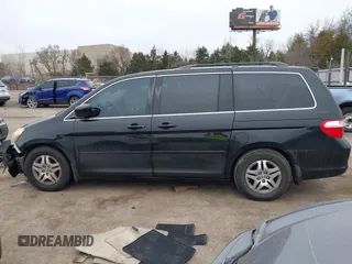 2006 Honda Odyssey EX-L with VIN 5FNRL38716B011262, listed as a IAAI auction lot 41707671 with 183,861 mi miles. Bid and sale history available at carsss.com. Image 14.