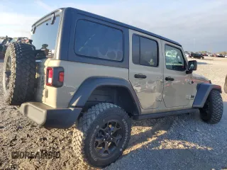 2022 Jeep Wrangler Unlimited Willys with VIN 1C4HJXDNXNW267388, listed as a Copart auction lot 72142634 with 23,631 mi miles and Salvage Title. Bid and sale history available at DreamBid. Image 3.