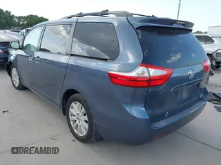 2015 Toyota Sienna Limited with VIN 5TDDK3DC8FS102900, listed as a IAAI auction lot 42449627 with 85,261 mi miles and . Bid and sale history available at DreamBid. Image 3.
