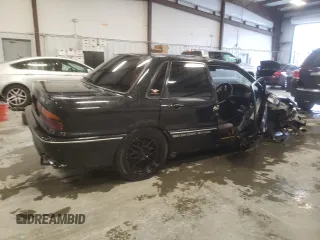 1988 Mitsubishi Galant with VIN E39A0010917, listed as a Copart auction lot 44421775 with 14,813 mi miles and Salvage Title. Bid and sale history available at DreamBid. Image 3.