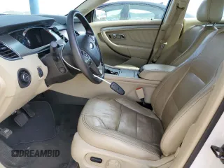 2015 Ford Taurus SEL with VIN 1FAHP2E92FG172960, listed as a Copart auction lot 84866524 with 115,115 mi miles and Salvage Title. Bid and sale history available at DreamBid. Image 7.