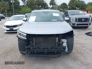 2021 Volkswagen Atlas SE with VIN 1V2JR2CA7MC556268, listed as a IAAI auction lot 41185525 with 73,724 mi miles and . Bid and sale history available at DreamBid. Image 13.