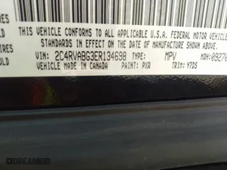 2014 Volkswagen Routan SE w/RSE & Navigation with VIN 2C4RVABG3ER134698, listed as a IAAI auction lot 41796736 with 110,282 mi miles. Bid and sale history available at carsss.com. Image 9.