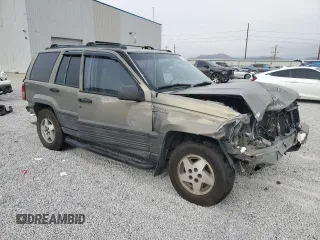 1995 Jeep Grand Cherokee Laredo with VIN 1J4GZ58S7SC743239, listed as a Copart auction lot 81717114 with 254,061 mi miles and Salvage Title. Bid and sale history available at carsss.com. Image 4.