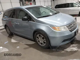 2011 Honda Odyssey EX with VIN 5FNRL5H44BB051539, listed as a IAAI auction lot 42119192 with 207,522 mi miles and . Bid and sale history available at carsss.com. Image 1.