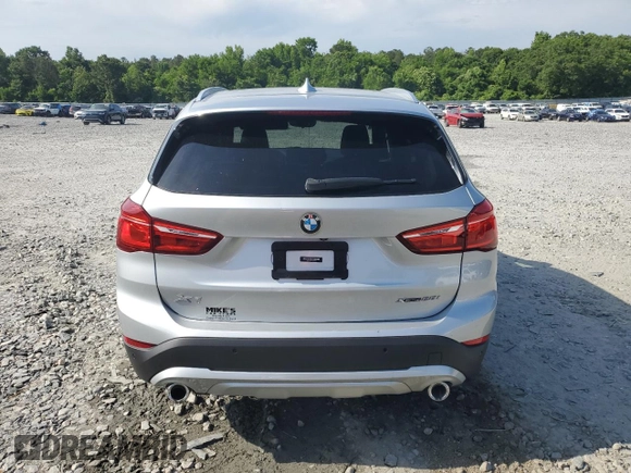 2020 BMW X1 xDrive28i z VIN WBXJG9C04L3L89568, wystawiony jako Copart lot #56646715 z przebiegiem 133 790 mil mil oraz Szkoda całkowita • Salvage title. Historia ofert i sprzedaży dostępna na DreamBid. Obrazek 6.