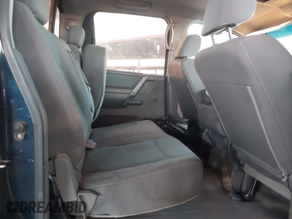 2006 Nissan Titan SE z VIN 1N6AA07AX6N509540, wystawiony jako IAAI lot #42054973 z przebiegiem 166 413 mil mil oraz . Historia ofert i sprzedaży dostępna na DreamBid. Obrazek 8.