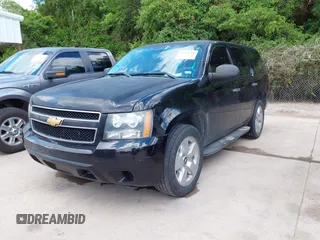 2013 Chevrolet Tahoe Commercial with VIN 1GNLC2E09DR286027, listed as a IAAI auction lot 42229760 with 203,474 mi miles and . Bid and sale history available at DreamBid. Image 2.