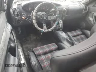 1999 Porsche 911 z VIN WP0AA299XXS623462, wystawiony jako Copart lot #85549554 z przebiegiem Nie podano mil oraz Szkoda całkowita • Salvage title. Historia ofert i sprzedaży dostępna na DreamBid. Obrazek 8.