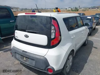 2015 Kia Soul with VIN KNDJN2A23F7779783, listed as a IAAI auction lot 41891145 with 96,449 mi miles. Bid and sale history available at carsss.com. Image 4.