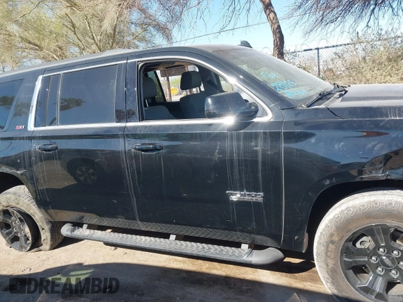 2020 Chevrolet Suburban LT with VIN 1GNSKHKC5LR303081, listed as a IAAI auction lot 41896511 with 60,121 mi miles and . Bid and sale history available at DreamBid. Image 12.