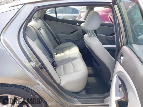 2013 Kia Optima EX z VIN 5XXGN4A73DG246046, wystawiony jako IAAI lot #42196691 z przebiegiem 82 840 mil mil oraz . Historia ofert i sprzedaży dostępna na DreamBid. Obrazek 8.