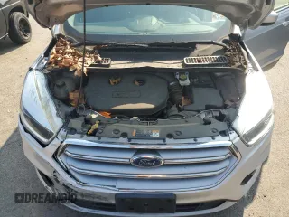 2017 Ford Escape SE z VIN 1FMCU9G99HUF01057, wystawiony jako Copart lot #60351695 z przebiegiem Nie podano mil oraz Czysty tytuł • Clean title. Historia ofert i sprzedaży dostępna na DreamBid. Obrazek 11.