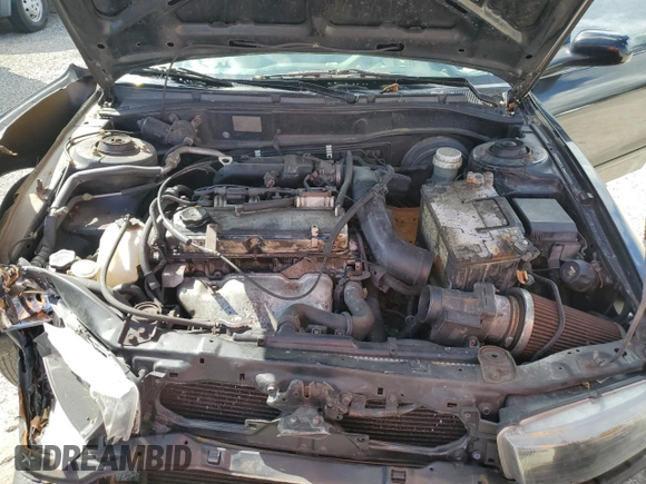 2002 Mitsubishi Galant with VIN 4A3AA36G12E165484, listed as a Copart auction lot 77563634 with 189,776 mi miles and Salvage Title. Bid and sale history available at DreamBid. Image 11.