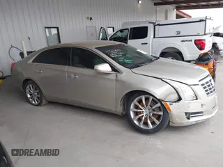 2015 Cadillac XTS Luxury z VIN 2G61M5S39F9246298, wystawiony jako IAAI lot #41555093 z przebiegiem 126 928 mil mil oraz . Historia ofert i sprzedaży dostępna na DreamBid. Obrazek 13.
