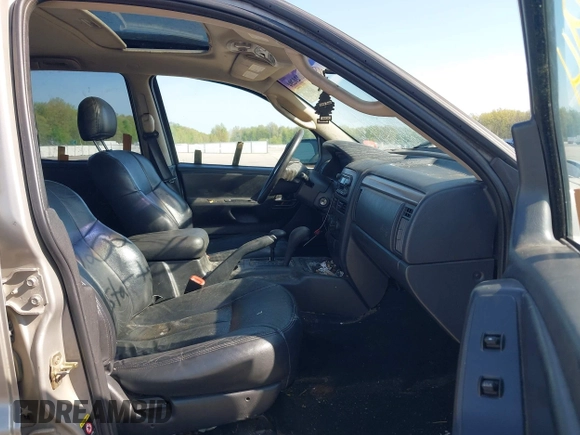 2002 Jeep Grand Cherokee with VIN 1J8GW48N72C207838, listed as a IAAI auction lot 42020294 with 181,283 mi miles and . Bid and sale history available at DreamBid. Image 5.