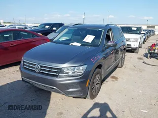 2020 Volkswagen Tiguan SE with VIN 3VV3B7AXXLM137641, listed as a IAAI auction lot 41830400 with 68,067 mi miles and . Bid and sale history available at DreamBid. Image 2.