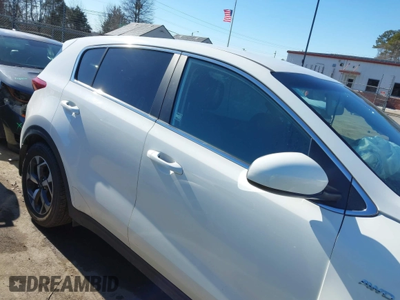 2020 Kia Sportage LX with VIN KNDPMCAC4L7792355, listed as a IAAI auction lot 41433828 with 67,139 mi miles. Bid and sale history available at carsss.com. Image 13.