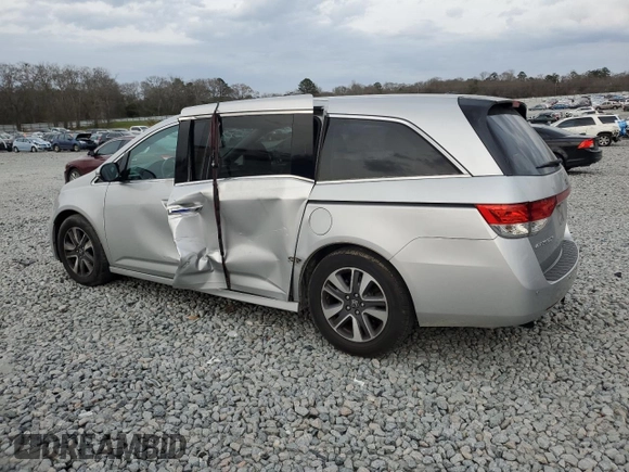 2014 Honda Odyssey Touring with VIN 5FNRL5H90EB096137, listed as a Copart auction lot 47192275 with 164,620 mi miles and Salvage Title. Bid and sale history available at DreamBid. Image 2.