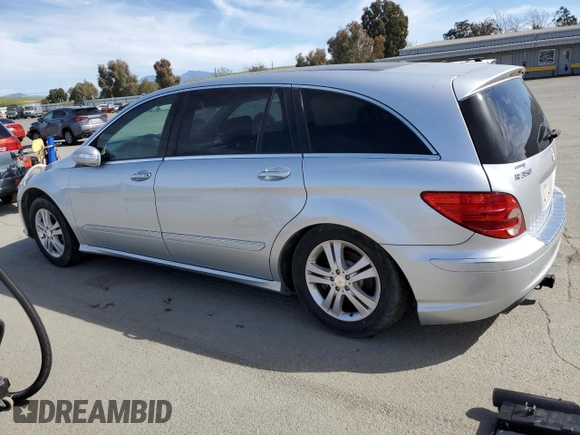 2009 Mercedes-Benz R 3.5L with VIN 4JGCB65E79A091057, listed as a Copart auction lot 52186915 with 99,173 mi miles and Salvage Title. Bid and sale history available at DreamBid. Image 2.