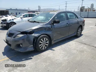2010 Toyota Corolla with VIN 1NXBU4EEXAZ354803, listed as a Copart auction lot 61013865 with 223,171 mi miles and Salvage title. Bid and sale history available at DreamBid. Image 1.