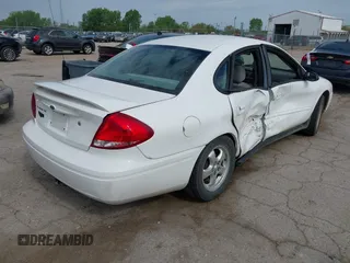2005 Ford Taurus SE with VIN 1FAHP532X5A195203, listed as a IAAI auction lot 42197177 with 152,256 mi miles and . Bid and sale history available at DreamBid. Image 4.