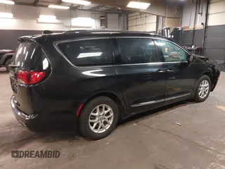 2020 Chrysler Pacifica Touring L with VIN 2C4RC1BG2LR280156, listed as a IAAI auction lot 42182406 with 105,038 mi miles and . Bid and sale history available at DreamBid. Image 4.