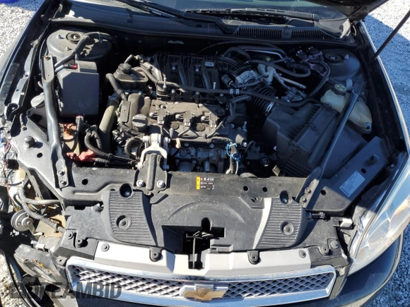 2014 Chevrolet Impala LT z VIN 2G1WB5E38E1177646, wystawiony jako Copart lot #46181965 z przebiegiem 103 372 mil mil oraz Szkoda całkowita • Salvage title. Historia ofert i sprzedaży dostępna na DreamBid. Obrazek 13.