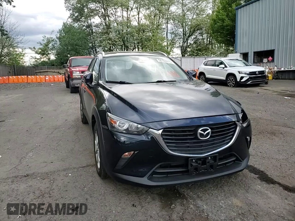 2018 Mazda CX-3 Sport z VIN JM1DKFB79J1323497, wystawiony jako Copart lot #56168875 z przebiegiem 60 284 mil mil oraz Szkoda całkowita • Salvage title. Historia ofert i sprzedaży dostępna na DreamBid. Obrazek 14.