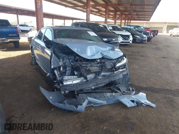 2022 Honda Civic Si with VIN 2HGFE1E58NH473302, listed as a IAAI auction lot 41473435 with 34,685 mi miles and . Bid and sale history available at DreamBid. Image 1.