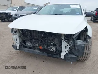 2022 Nissan Altima SR with VIN 1N4BL4CV7NN326103, listed as a IAAI auction lot 41644881 with 54,580 mi miles and . Bid and sale history available at DreamBid. Image 6.