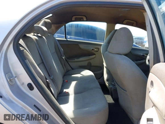 2010 Toyota Corolla with VIN 1NXBU4EE1AZ319230, listed as a IAAI auction lot 41988978 with 238,497 mi miles. Bid and sale history available at carsss.com. Image 8.