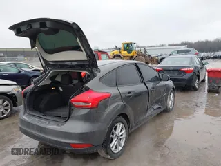 2015 Ford Focus SE with VIN 1FADP3K26FL383355, listed as a IAAI auction lot 41520459 with 142,111 mi miles and . Bid and sale history available at DreamBid. Image 4.